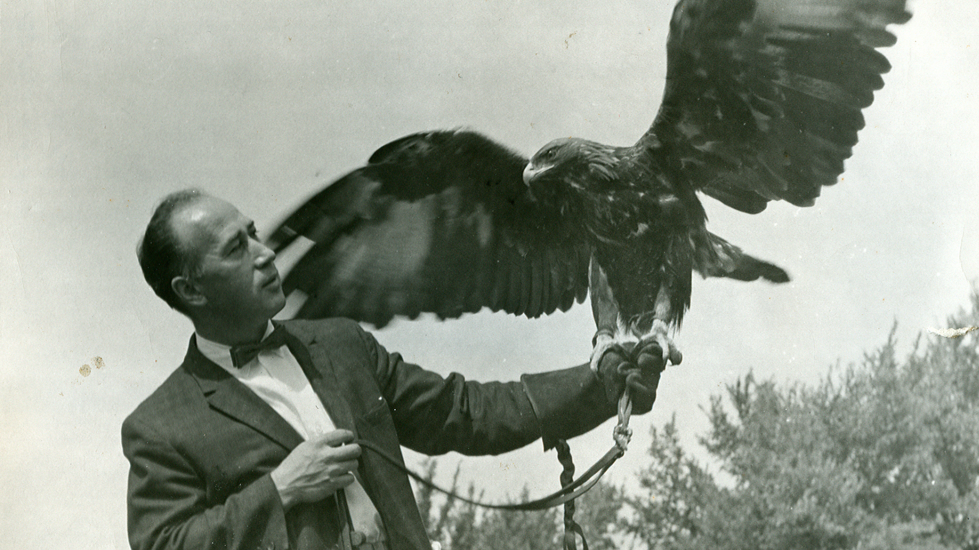 Man holding a bird